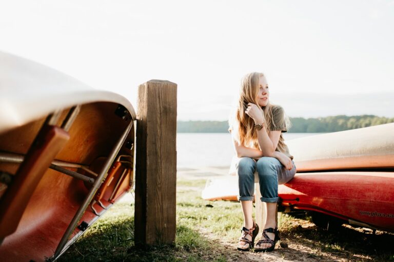 woman seating on boat hurts to pee