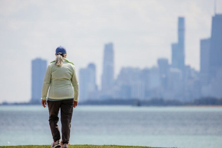 a woman standing contemplating menopause